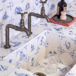 Classic Delft rustic Chalk White wall tiles in Rosalind Blue close up sink with glass