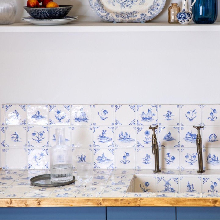 Classic Delft rustic Chalk White wall tiles in Rosalind Blue kitchen with jug of water