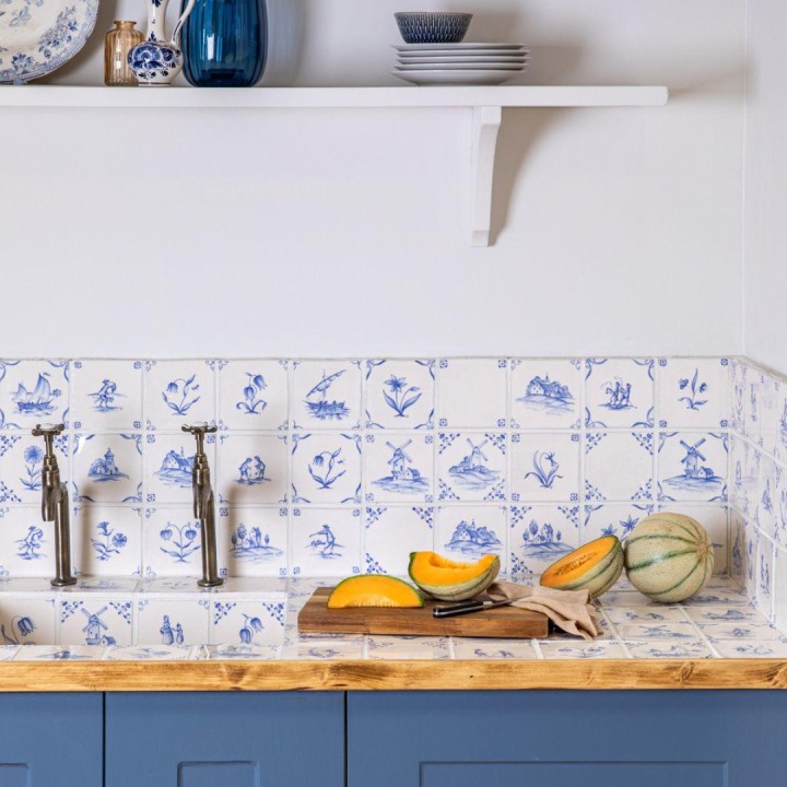 Classic Delft rustic Chalk White wall tiles in Rosalind Blue kitchen worktop with melons