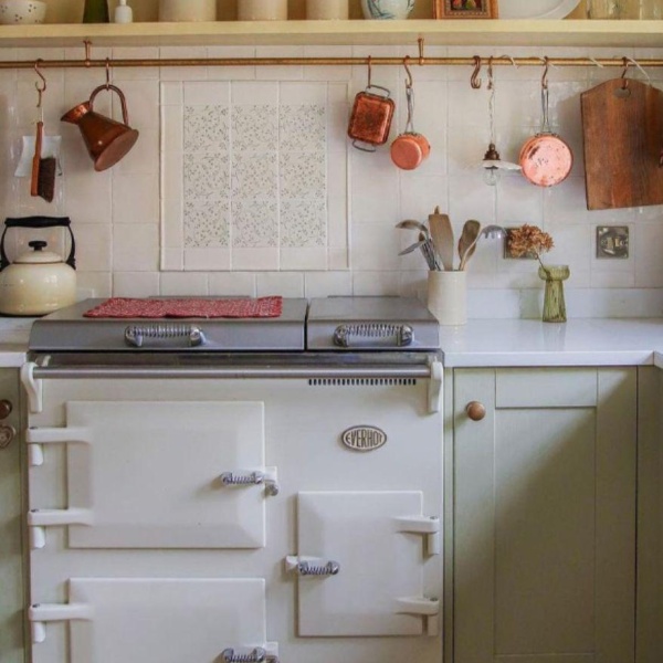 Handpainted Emma patterned wall tiles in the kitchen of designer Emma Diaz