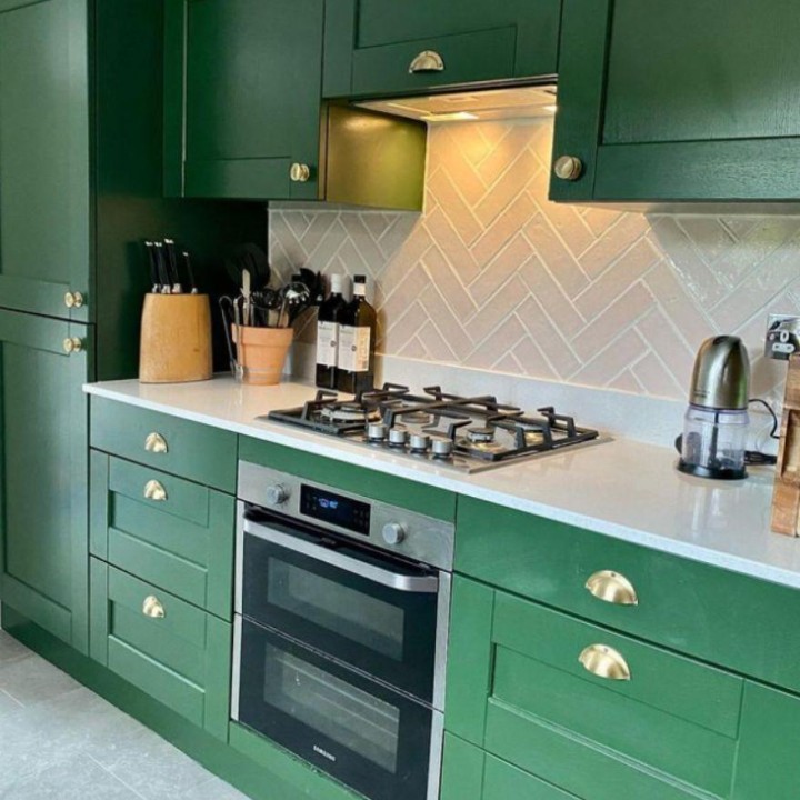 Kennet Pewsey Vale skinny metro wall tiles in this green kitchen space