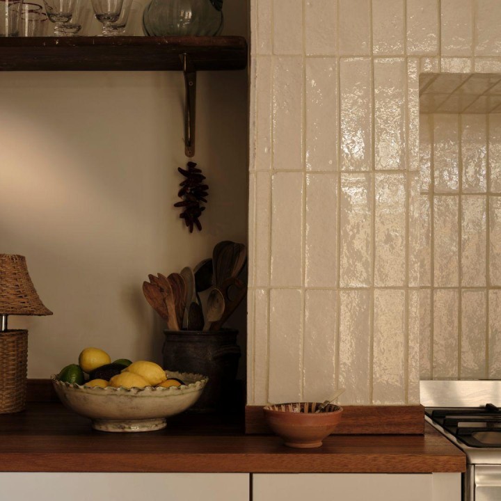 Kennet Winterbourne with beige grout around kitchen stove in home of Harriet Howarth