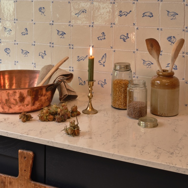 Beautiful autumnal kitchen with hand painted tiles