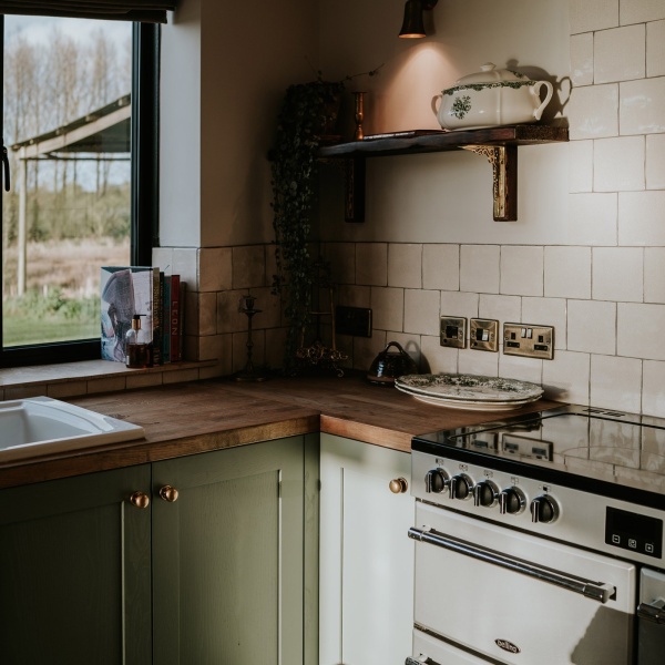 Green kitchen, white tiles, autumn aesthetic