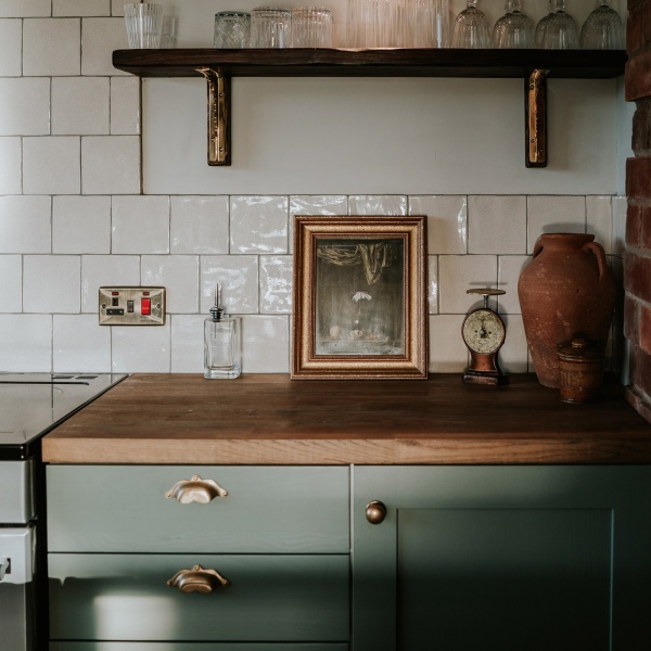 A beautiful kitchen with handmade crackle glaze tiles in white